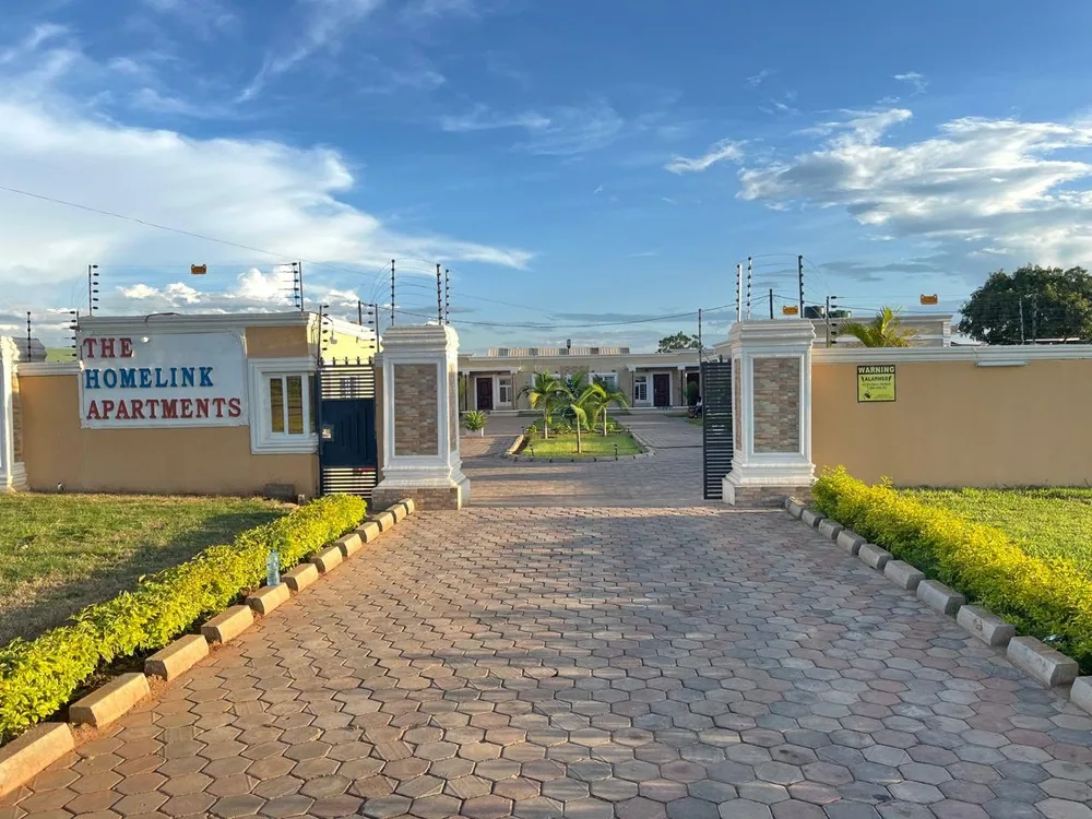 The gate on Nsansa Road, late afternoon